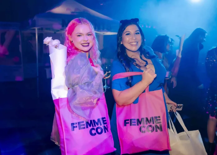 Female models promoting Femme Con