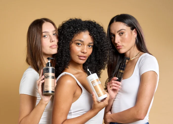 Female model holding Eloron skincare product